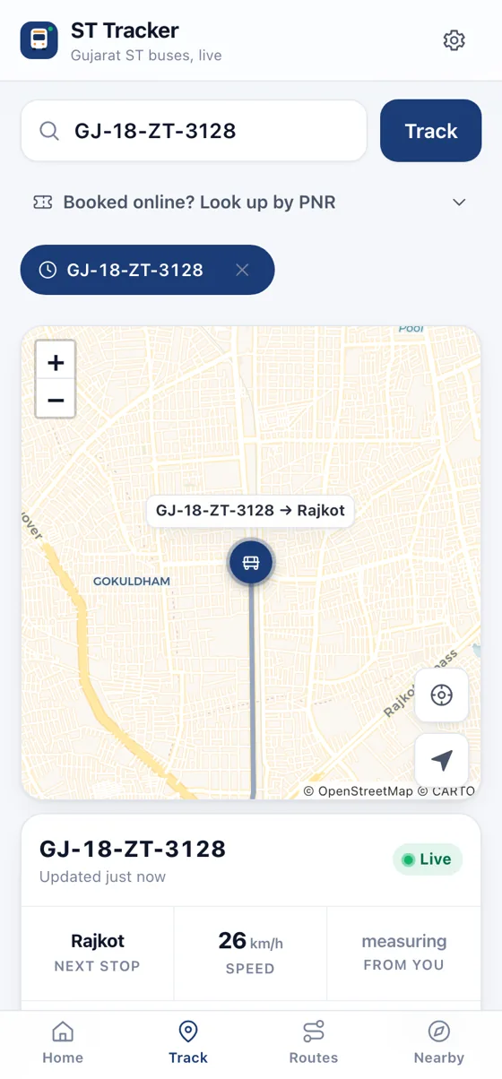 The ST Tracker Track screen: a live Gujarat ST bus on the map with its next stop, speed and distance from you.
